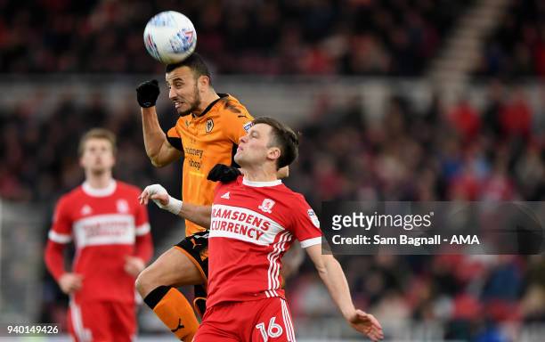 Romain Saiss of Wolverhampton Wanderers and Jonny Howson of Middlesbrough during the Sky Bet Championship match between Middlesbrough and...
