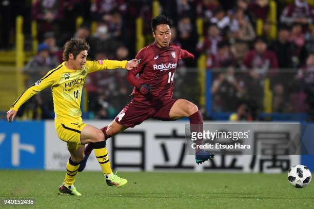 Naoyuki Fujita of Vissel Kobe and Junya Ito of Kashiwa Reysol compete for the ball during the J.League J1 match between Kashiwa Reysol and Vissel...