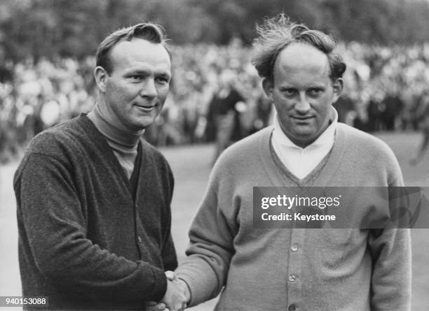 American golfer Arnold Palmer is congratulated by British runner-up Neil Coles after winning the Piccadilly World Match Play Championship at...