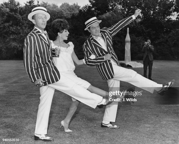 English actress Joan Collins with co-stars Bob Hope and Bing Crosby as they start work at Shepperton Studios on the film 'The Road To Hong Kong', 2nd...