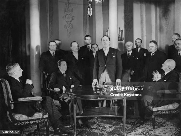 Austrian Chancellor Kurt Schuschnigg , Italian Foreign Minister Galeazzo Ciano and Hungarian Foreign Minister Kalman Kanya just before signing the...