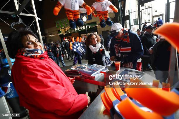 Fans buy programs prior to the Detroit Tigers and Pittsburgh Pirates on Opening Day at Comerica Park on March 30, 2017 in Detroit, Michigan.