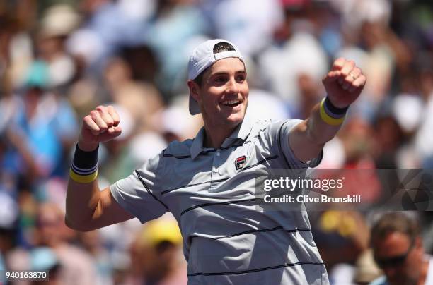 John Isner of the United States celebrates after his straight sets victory against Juan Martin Del Potro of Argentina in their semifinal match during...