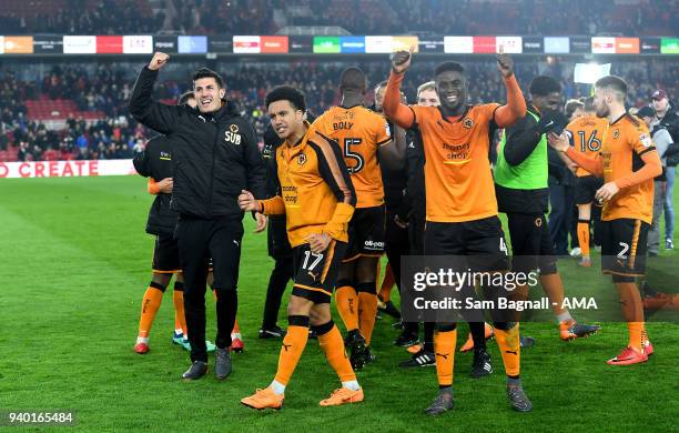 Danny Batth of Wolverhampton Wanderers, Helder Costa of Wolverhampton Wanderers and Alfred NDiaye of Wolverhampton Wanderers celebrate at full time...