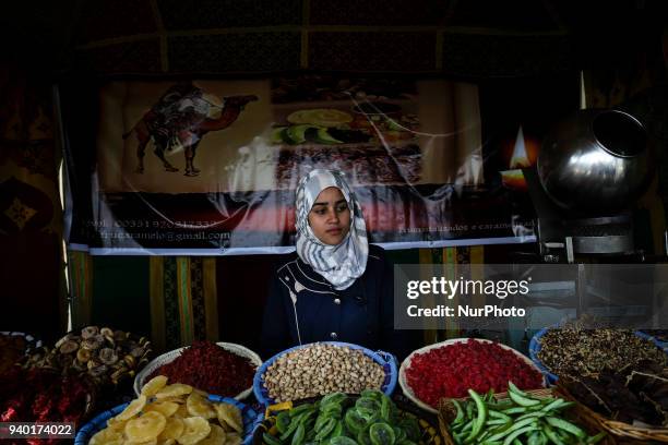 Woman in a stand selling tradicional food during the III Medieval Festival at Parque da Vila in Quinta do Conde, outskirts of Lisbon, on March 30,...