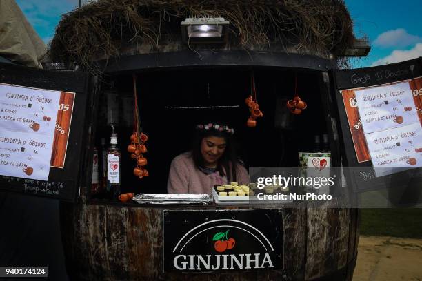 Woman in a stand selling tradicional drinks during the III Medieval Festival at Parque da Vila in Quinta do Conde, outskirts of Lisbon, on March 30,...