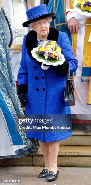 Queen Elizabeth II attends the Royal Maundy Service at St George's Chapel on March 29, 2018 in Windsor, England. During the service The Queen...