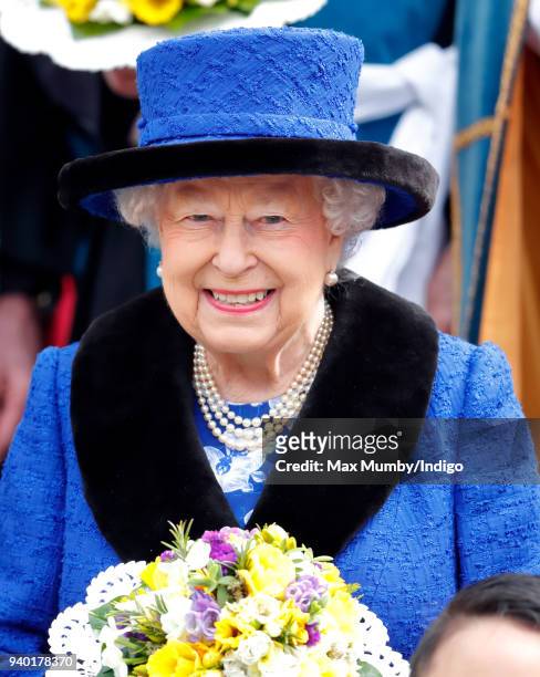 Queen Elizabeth II attends the Royal Maundy Service at St George's Chapel on March 29, 2018 in Windsor, England. During the service The Queen...
