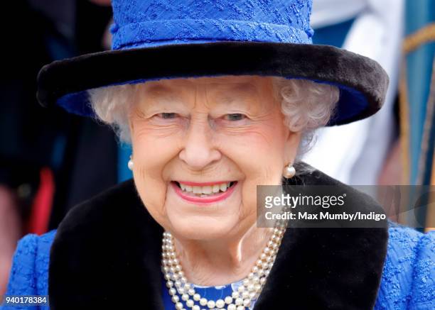 Queen Elizabeth II attends the Royal Maundy Service at St George's Chapel on March 29, 2018 in Windsor, England. During the service The Queen...