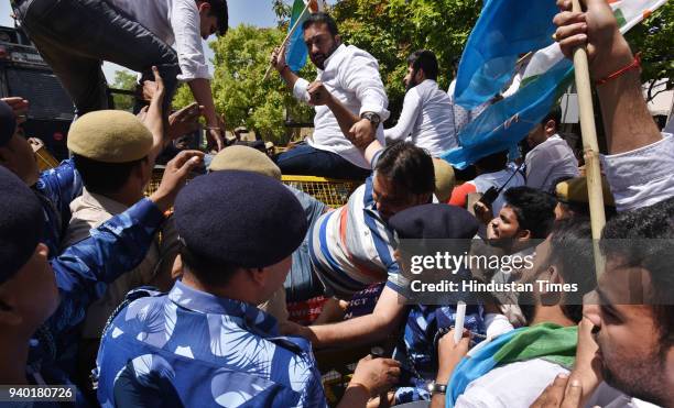 Delhi Police and RAF paramilitary forces detained NSUI supporters and class X & XII students, during the protest against HRD Minister Prakash...