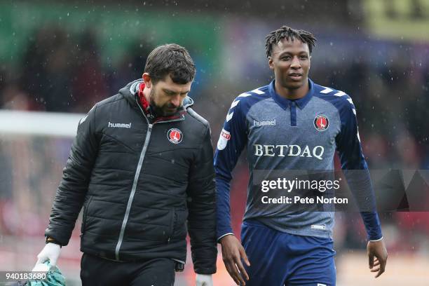 Joe Aribo of Charlton Athletic leaves the pitch with Alastair Thrush during the Sky Bet League One match between Northampton Town and Charlton...