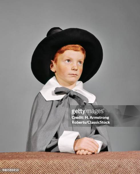 1960s SERIOUS BOY DRESSED IN PILGRIM CLOTHES COSTUME FOR THANKSGIVING SCHOOL PLAY
