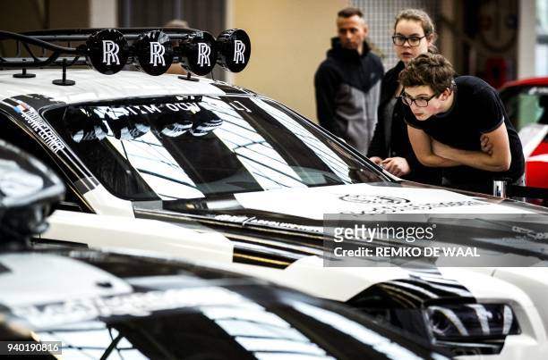 Visitors during the first edition of the International Amsterdam Motor Show in the RAI in Amsterdam on March 30, 2018. During Easter the exhibition...