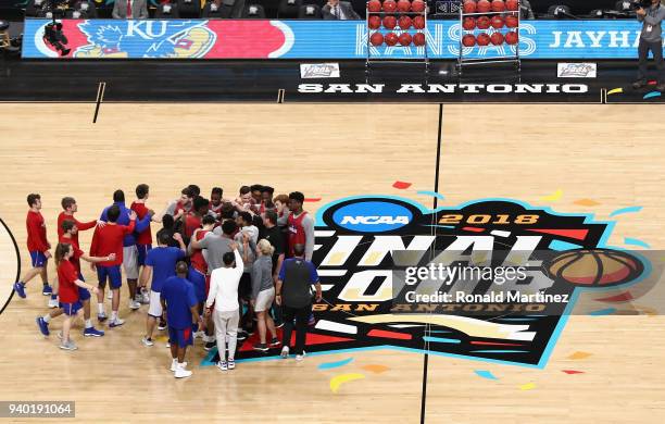 The Kansas Jayhawks huddle during practice before the 2018 Men's NCAA Final Four at the Alamodome on March 30, 2018 in San Antonio, Texas.
