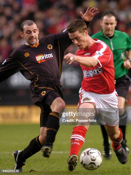 Scott Parker of Charlton Athletic is challenged by Colin Cameron of Wolverhampton Wanderers during the FA Barclaycard Premiership match between...