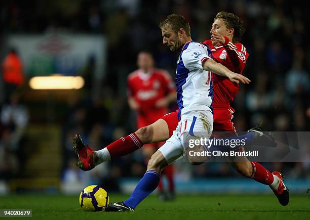 Vince Grella of Blackburn Rovers in action with Lucas Leiva of Liverpool during the Barclays Premier League match between Blackburn Rovers and...