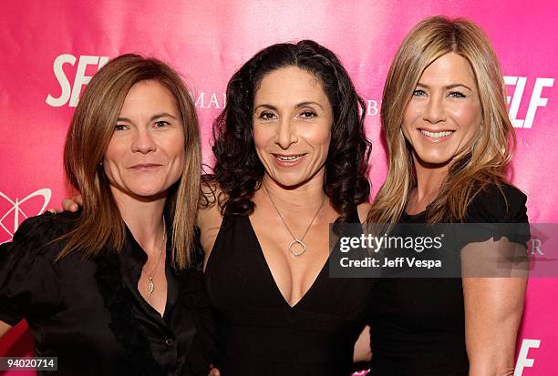 Producer Kristin Hahn, yoga instructor Mandy Ingber, and actress Jennifer Aniston attend Mandy Ingber's Yogalosophy DVD launch with SELF magazine and...