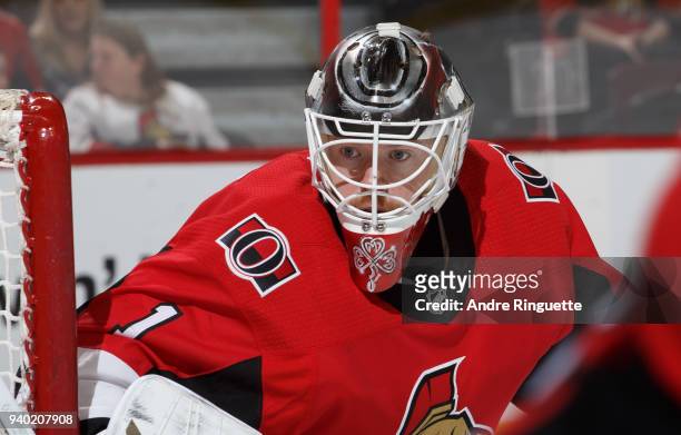Mike Condon of the Ottawa Senators tends net against the New York Islanders at Canadian Tire Centre on March 27, 2018 in Ottawa, Ontario, Canada.