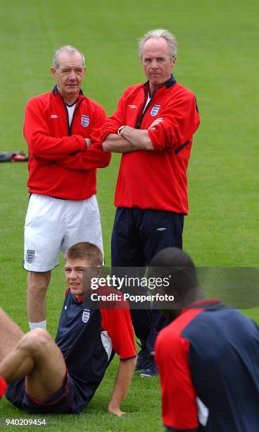 England coach Sven Goran Eriksson and his assistant Tord Grip look on during a training session at the England training camp in Sardinia, Italy on...