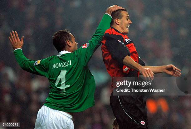 Alexander Meier of Frankfurt in action with Nikolce Noveski of Mainz during the Bundesliga match between Eintracht Frankfurt and FSV Mainz 05 at...