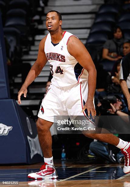 Jason Collins of the Atlanta Hawks against the Toronto Raptors at Philips Arena on December 2, 2009 in Atlanta, Georgia. NOTE TO USER: User expressly...