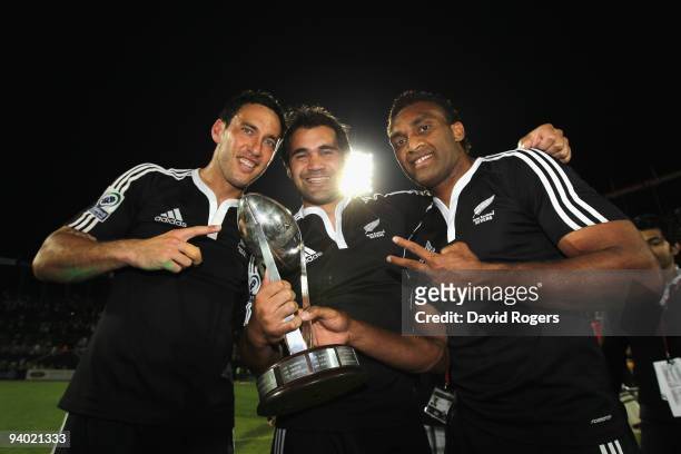 Zar Lawrence, Onosai Auva'a and Save Tokula of New Zealand celebrate after their win over Samoa in the final of the IRB Sevens tournament at the...