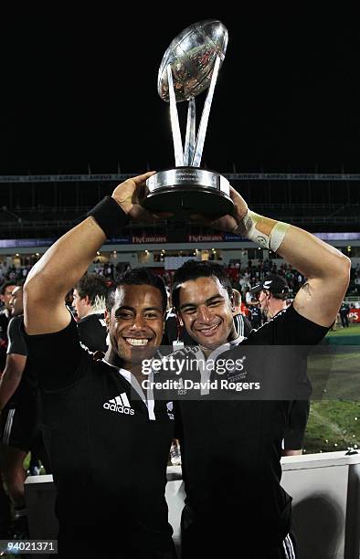 Buxton Popoalii and Sherwin Stowers of New Zealand celebrate after their win over Samoa in the final of the IRB Sevens tournament at the Dubai Sevens...