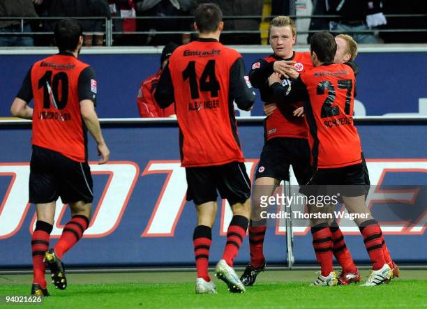 Maik Franz of Frankfurt celebrates with his team mates after scoring the 1:0 during the Bundesliga match between Eintracht Frankfurt and FSV Mainz 05...