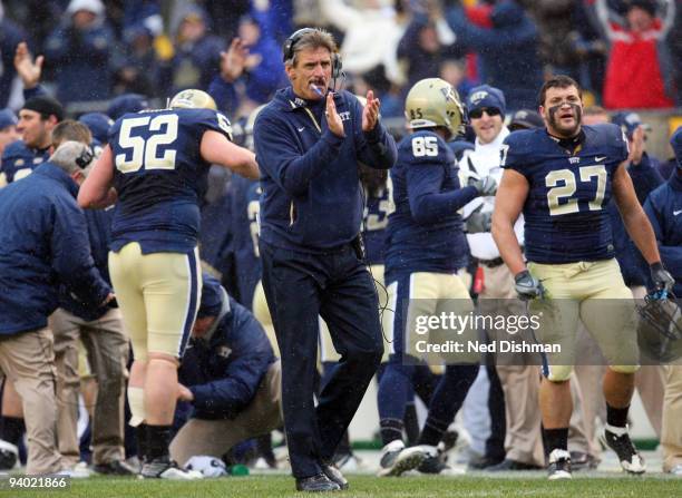 Head coach Dave Wannstedt of the University of Pittsburgh Panthers celebrates after a touchdown during the game against the University of Cincinnati...