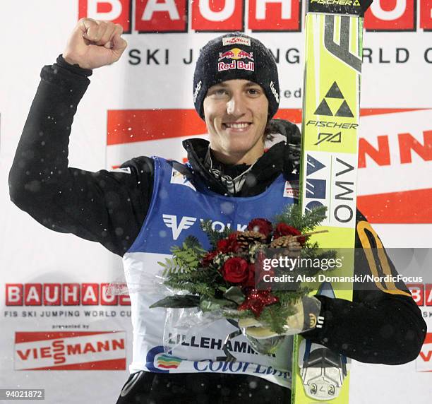 Gregor Schlierenzauer of Austria celebrates after winning the Ski Jumping HS 138 event during day one of the FIS World Cup on December 5, 2009 in...