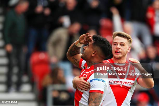 St Helens' Ben Barba celebrates with Danny Richardson after scoring a try during the Super League match at the Totally Wicked Stadium, St Helens.