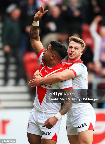 St Helens' Ben Barba celebrates with Danny Richardson after scoring a try during the Super League match at the Totally Wicked Stadium, St Helens.