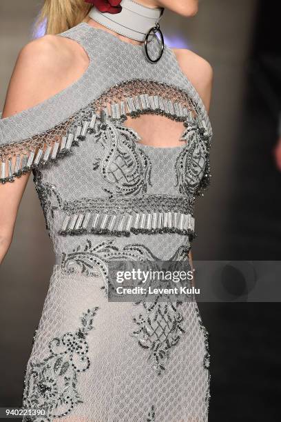 Model, fashion detail, walks the runway at the Zeynep Tosun show during Mercedes Benz Fashion Week Istanbul at Zorlu Performance Hall on March 30,...