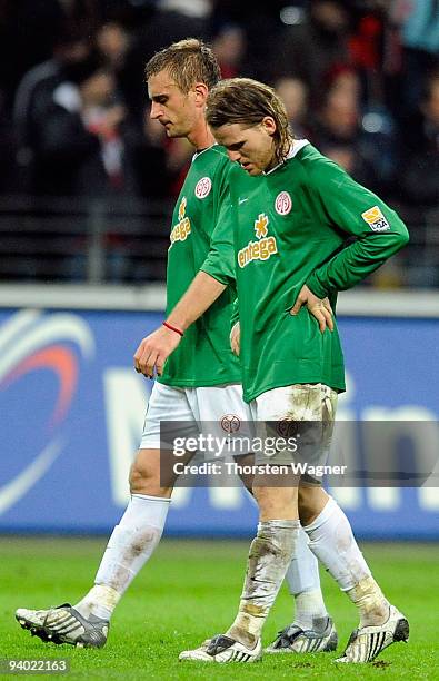 Milorad Pekovic and Eugen Polanski of Mainz look dejected after loosing the Bundesliga match between Eintracht Frankfurt and FSV Mainz 05 at...