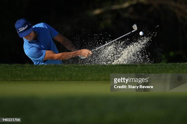 Rafa Cabrera Bello of Spain hits from a green side bunker on the 14th hole during the second round of the Houston Open at the Golf Club of Houston on...