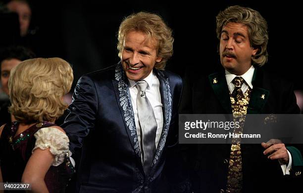 Comedians Anke Engelke and Bastian Pastewka perform as Wolfgang and Anneliese next to host Thomas Gottschalk attends the Wetten dass...? show at the...