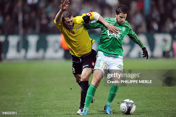 Saint-Etienne Belgian forward Kevin Mirallas vies with Sochaux's Serbian defender Ivan Stevanovic during the French L1 football match Saint-Etienne...