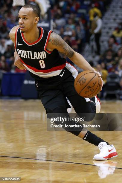 Shabazz Napier of the Portland Trail Blazers drives with the ball during the first half against the New Orleans Pelicans at the Smoothie King Center...