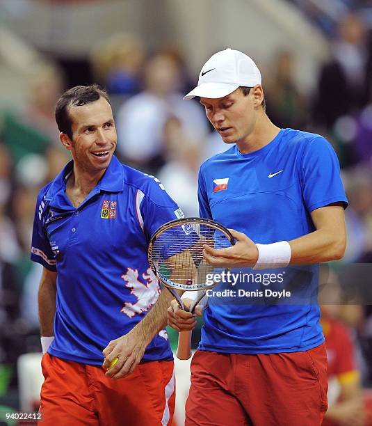 Radek Stepanek of Czech Republic smiles at his team mate Tomas Berdych during their Davis Cup World Group Final doubles match against Feliciano Lopez...