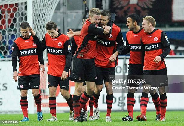 Alexander Meier celebrates after scoring the 2:0 with his team mates during the Bundesliga match between Eintracht Frankfurt and FSV Mainz 05 at...