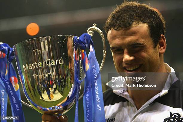 Jamie Roberts of the Barbarians with the winning trophy during the MasterCard trophy match between Barbarians and New Zealand at Twickenham Stadium...