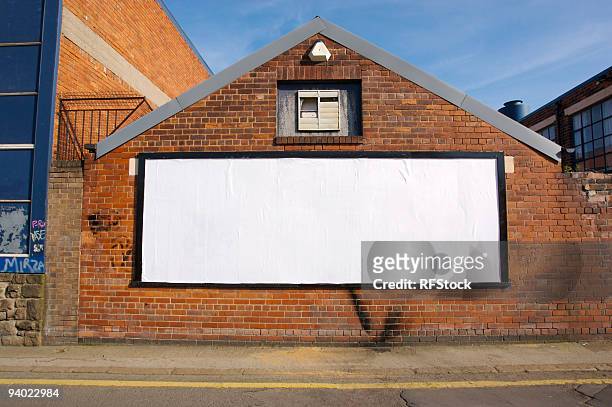 real blank billboard - placard stockfoto's en -beelden