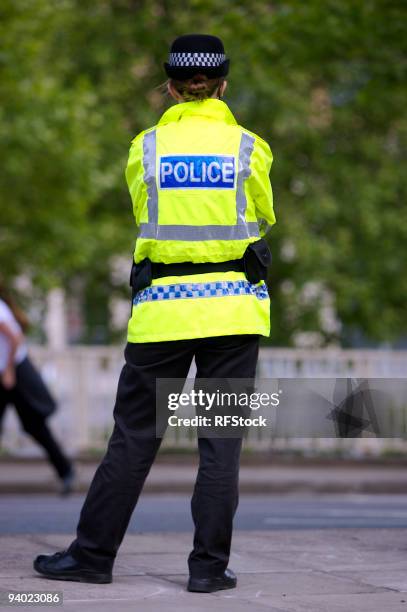 british police woman on duty - police uk stock pictures, royalty-free photos & images