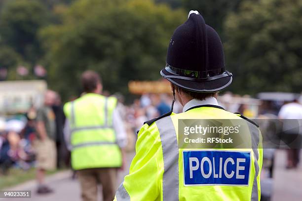 policing the summer fair - police officer uk stock pictures, royalty-free photos & images