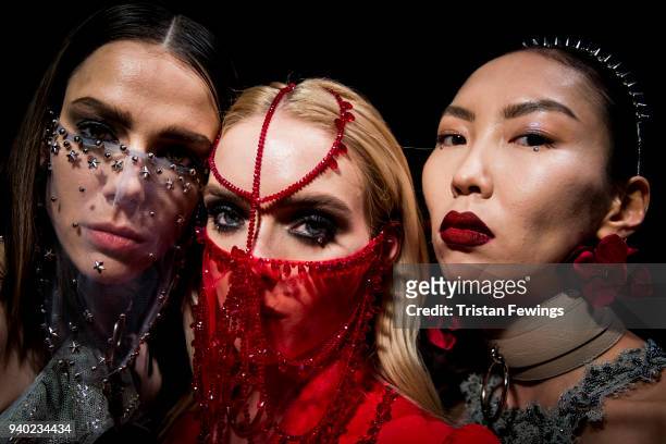 Models backstage ahead of the Zeynep Tosun show during Mercedes Benz Fashion Week Istanbul at Zorlu Performance Hall on March 30, 2018 in Istanbul,...