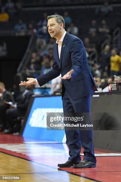 Head coach Ryan Odom of the UMBC Retrievers looks on during the second round of the 2018 NCAA Men's Basketball Tournament against the Kansas State...