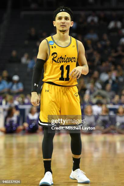 Maura of the UMBC Retrievers looks on during the second round of the 2018 NCAA Men's Basketball Tournament against the Kansas State Wildcats at the...