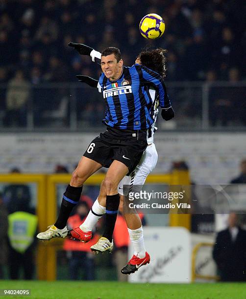 Amauri of Juventus FC competes for the ball with Lucio of FC Internazionale Milano during the Serie A match between Juventus and Inter Milan at...
