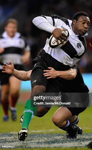 Tendai Mtawarira of the Barbarians in action during the MasterCard Trophy match between Barbarians and New Zealand at Twickenham Stadium on December...