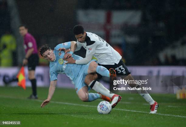 Curtis Davies of Derby County and Lynden Gooch of Sunderland in action during the Sky Bet Championship match between Derby County and Sunderland at...